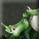 dragon holding a hatching egg