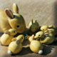 famille de petits lapins en céramique
