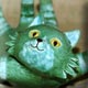 green pottery cat