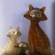 three ceramic cats