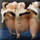 sculpture de quatre hippopotames qui dansent avec des grues sur le dos