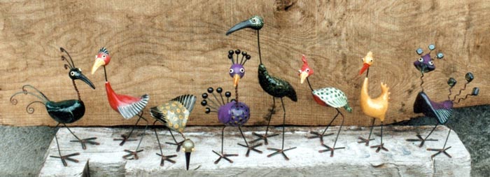 line of imaginary bird sculptures
