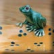 ceramic frog on a yellow dish