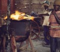 melting the bronze for casting