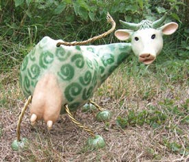 green and white cow