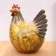 yellow hen sculpture with crackle glaze